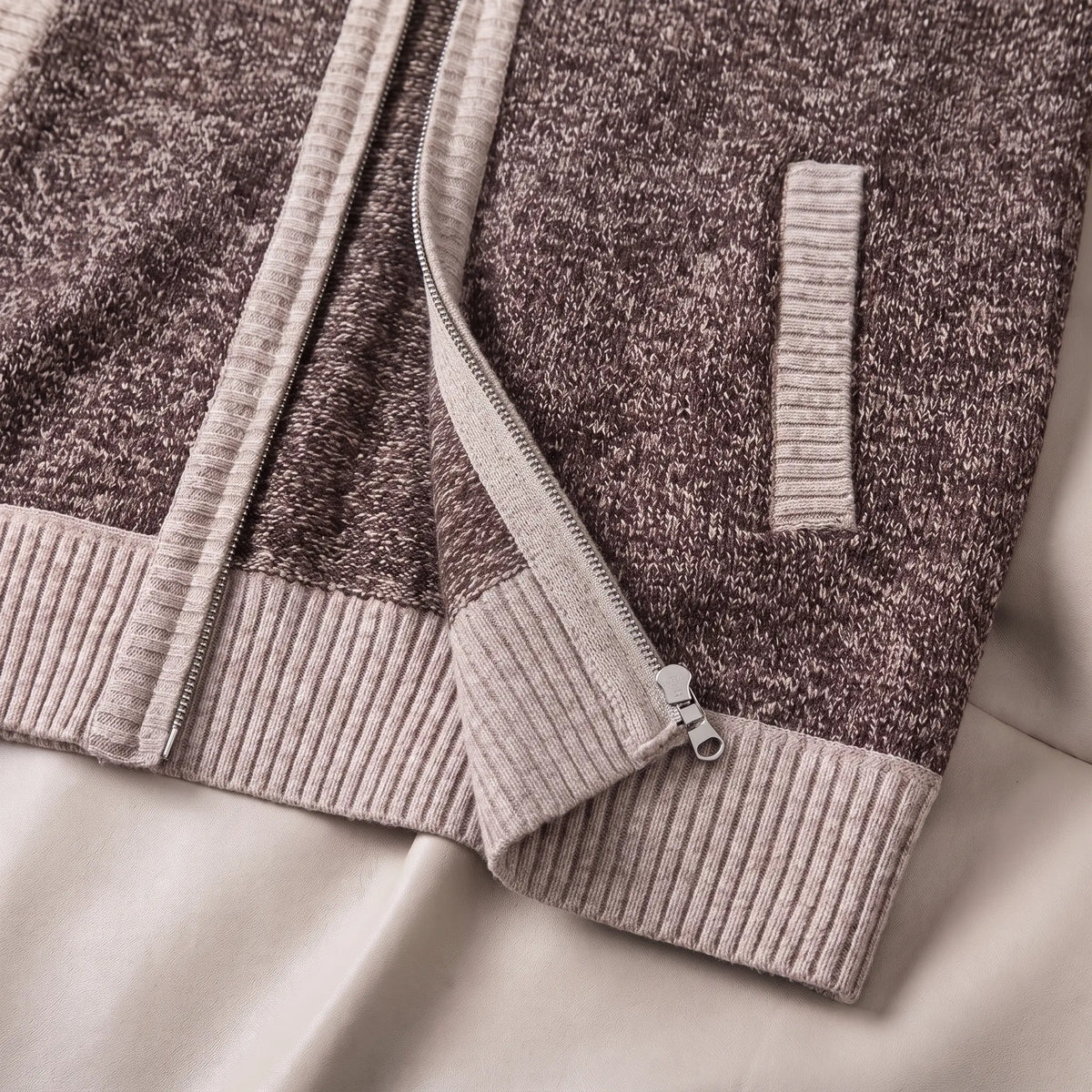 MARL ZIP CARDIGAN close-up of the rib hem, zip and pocket, coffee