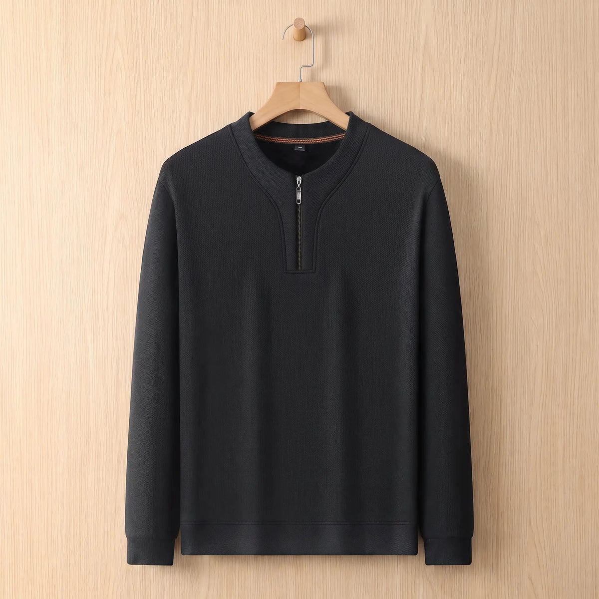 Notch Neck Pullover in black on a wooden hanger, men's textured half-zip sweater