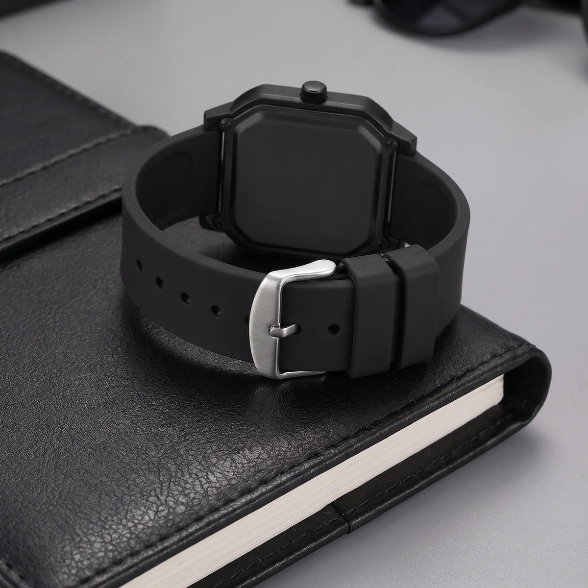 Case back and stainless steel buckle of the black octagon digital watch