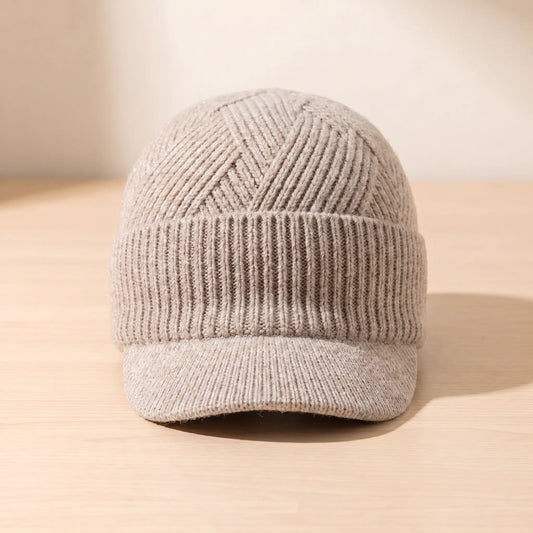 Men's beige peaked knit beanie with chevron ribbed crown and folded cuff