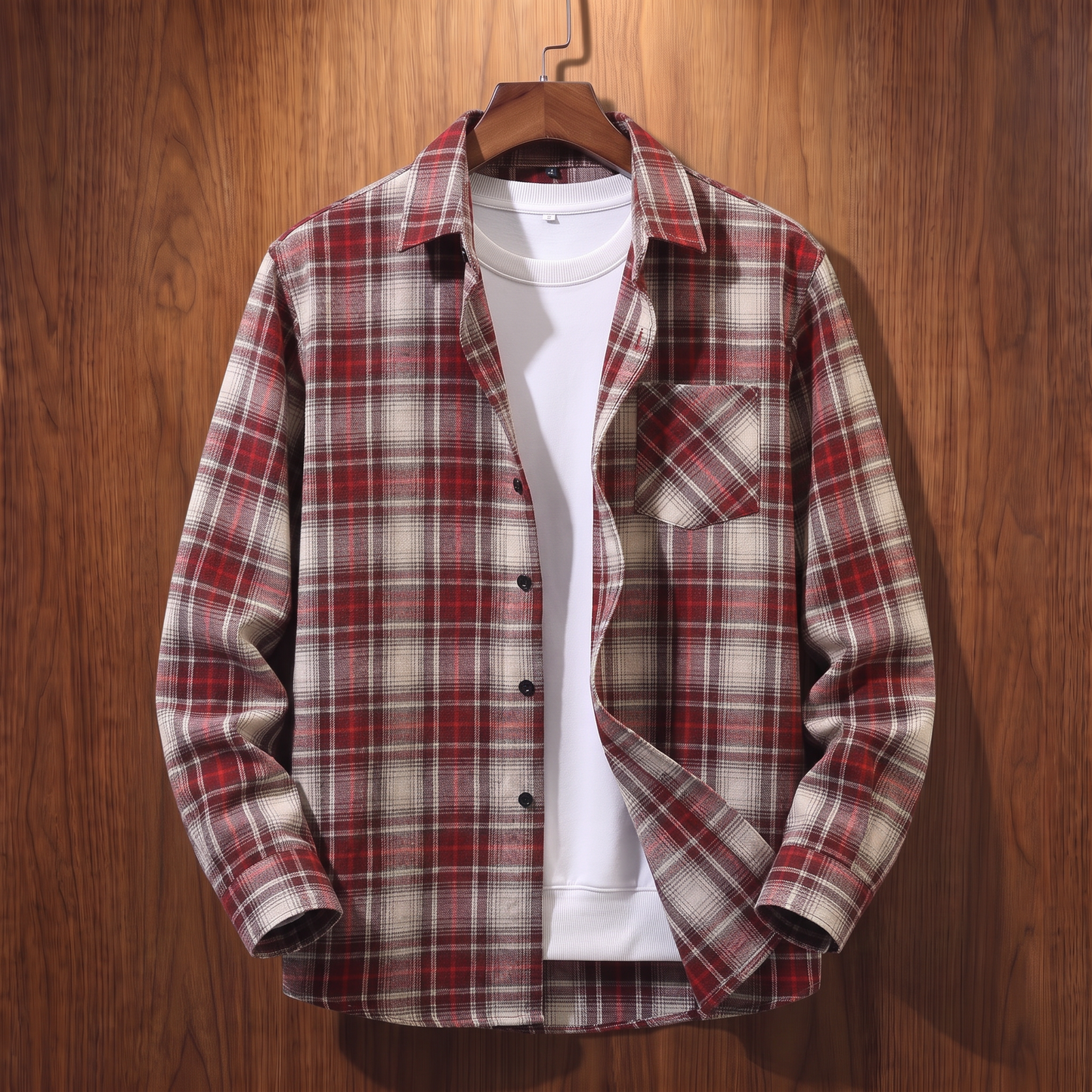 Red plaid flannel shacket on a wooden hanger