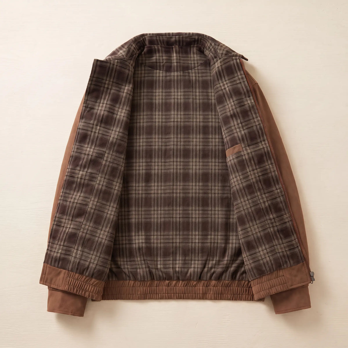 Inside of the PLAID PLACKET JACKET showing the plaid flannel lining