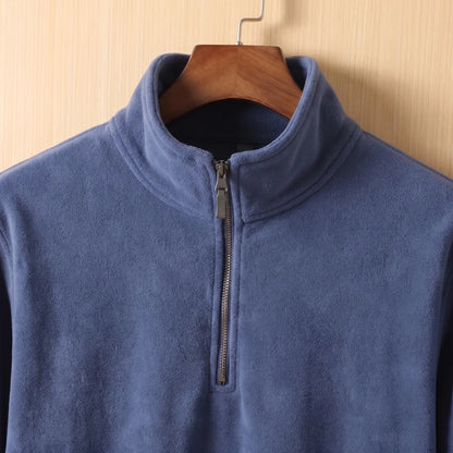 PLAIN FLEECE PULLOVER collar close-up - tall stand collar and short neck zip on the navy fleece