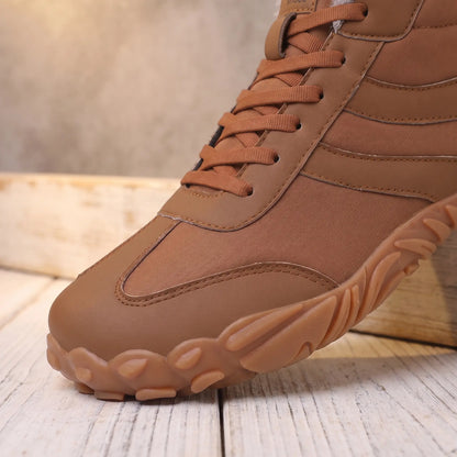 Close-up of the roomy toe and deep gum tread sole on the brown winter boot