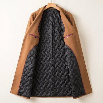 Inside of the quilted lining overcoat showing black quilted lining, burgundy piping and two inside pockets