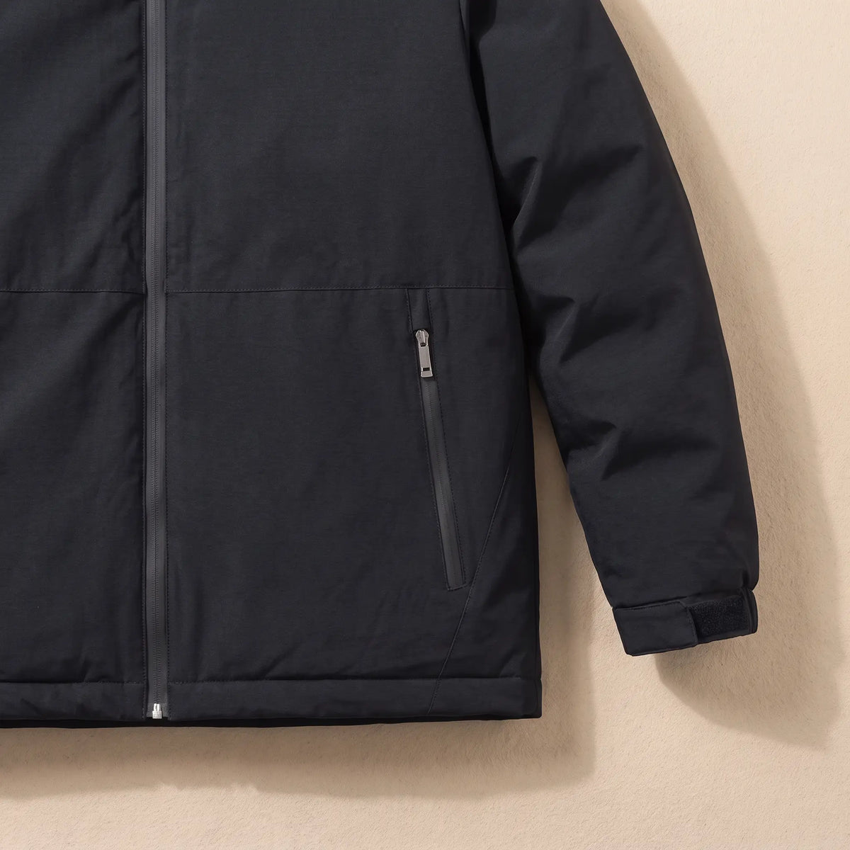 Quilt Lined Jacket zip hand pocket, hem and cuff tab close-up