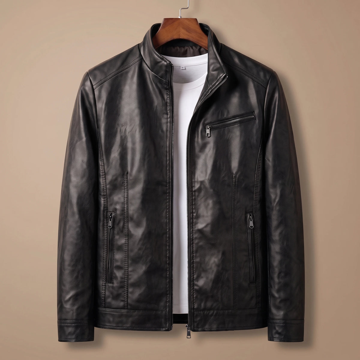 Black racer collar jacket on a wooden hanger