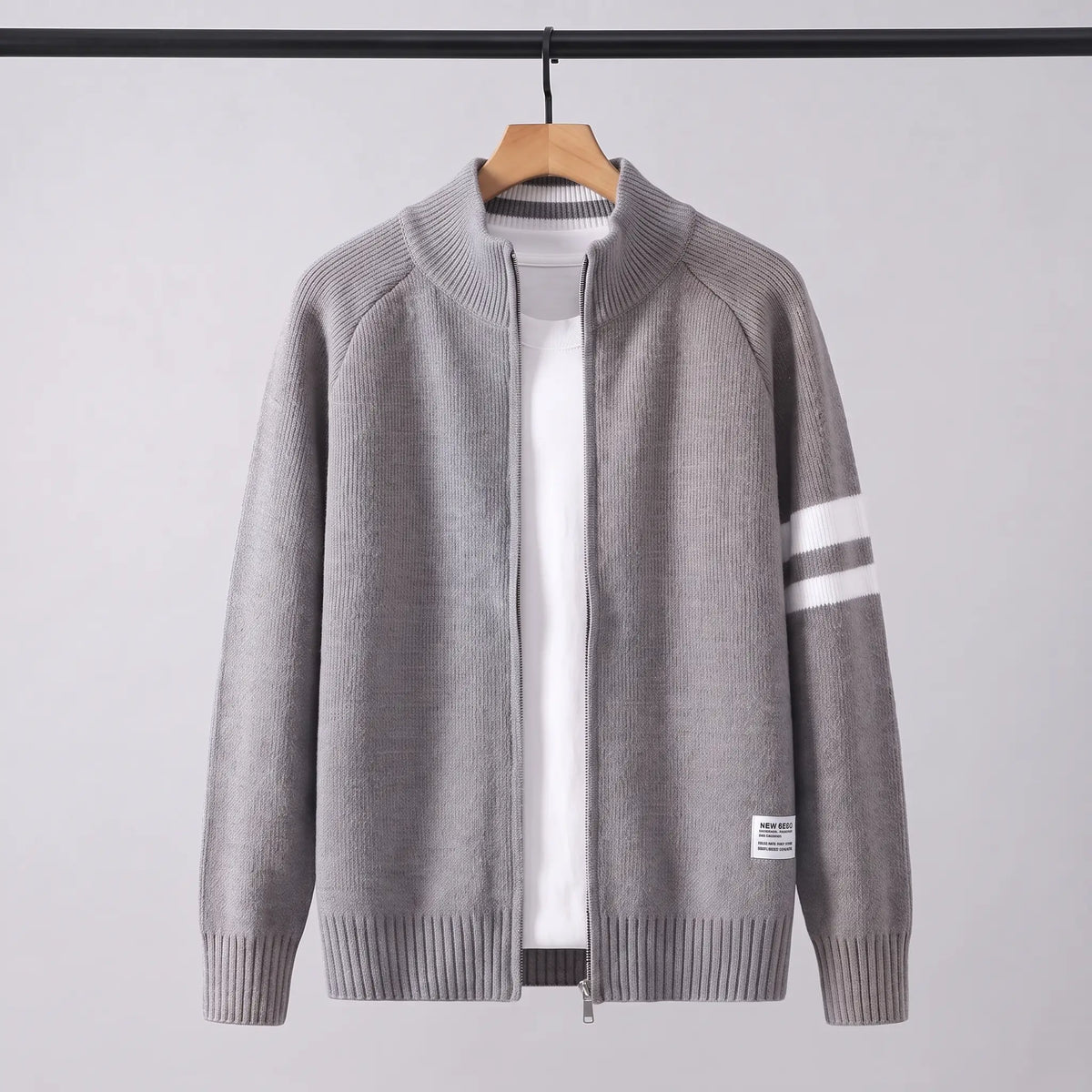 Raglan Zip Cardigan in gray on a wooden hanger, men's knit full-zip cardigan with stand collar