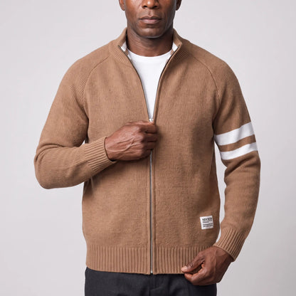 Man zipping up the brown Raglan Zip Cardigan over a white tee, men's knit stand collar cardigan