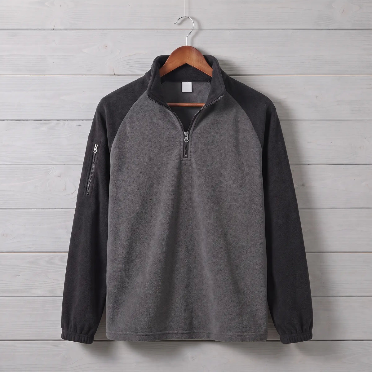 RAGLAN ZIP FLEECE in black, charcoal grey men's brushed fleece quarter-zip pullover with contrast raglan sleeves in black