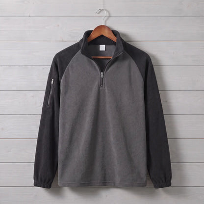 RAGLAN ZIP FLEECE in black, charcoal grey men's brushed fleece quarter-zip pullover with contrast raglan sleeves in black