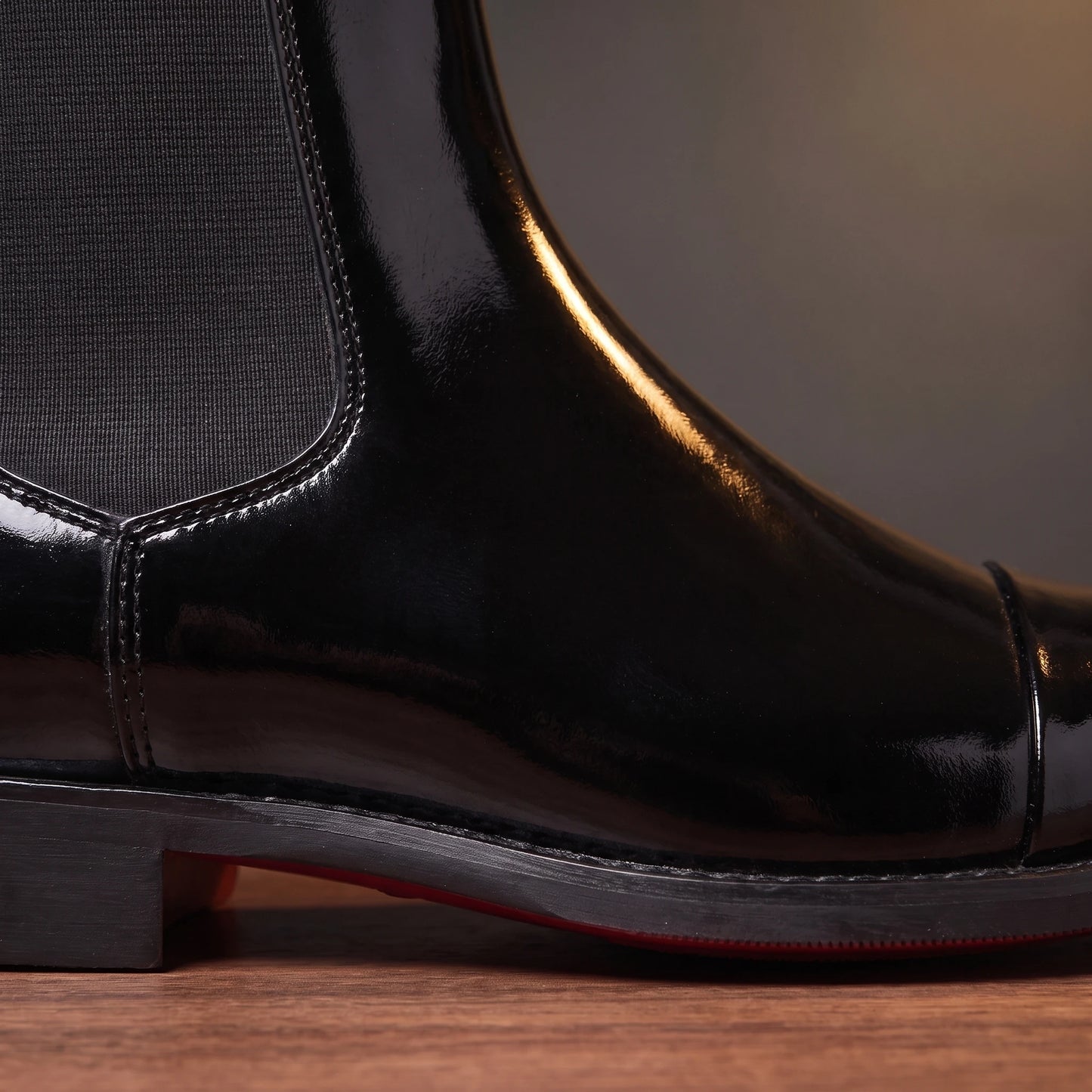 RED SOLE BOOTS black patent, side profile detail of elastic gore and red sole