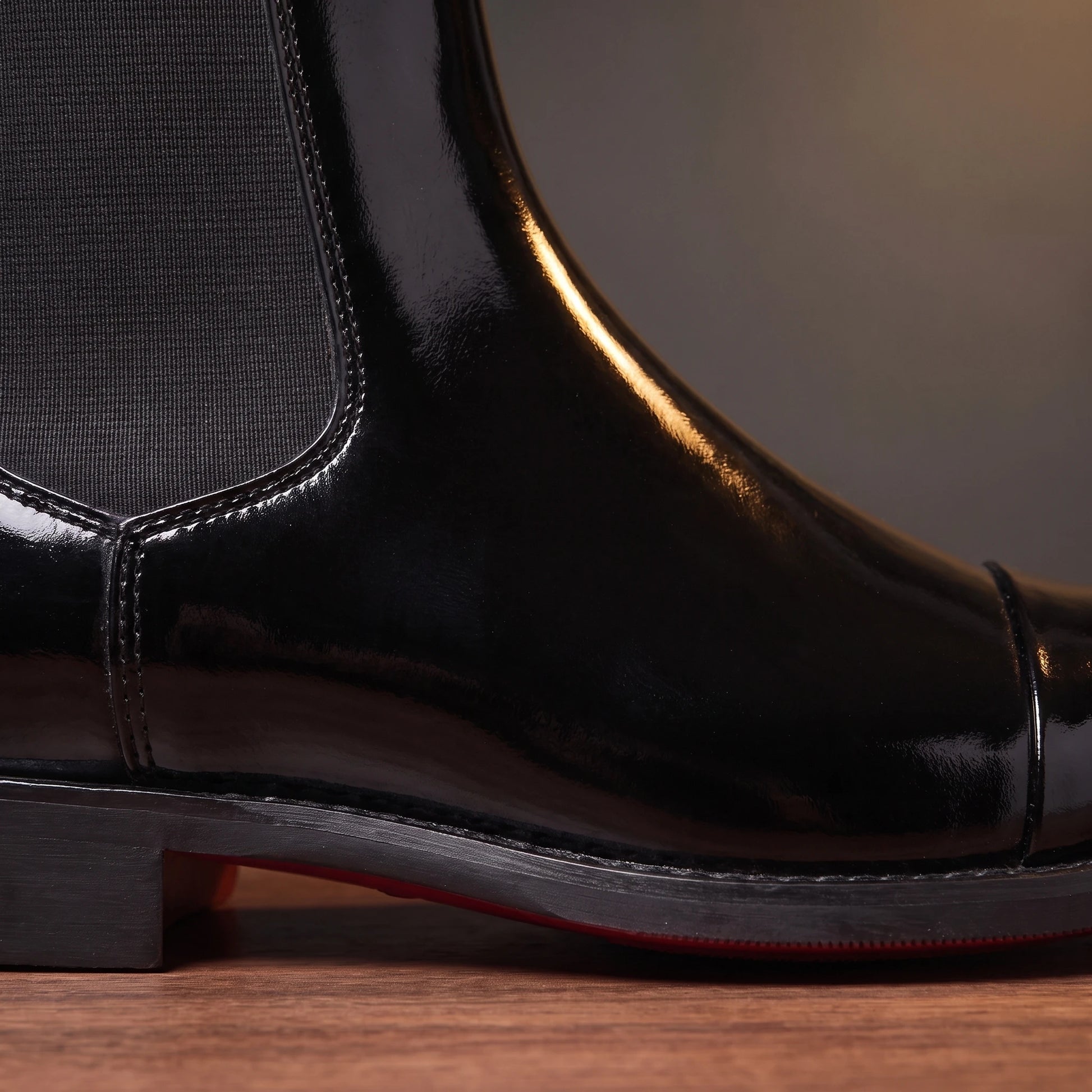 RED SOLE BOOTS black patent, side profile detail of elastic gore and red sole