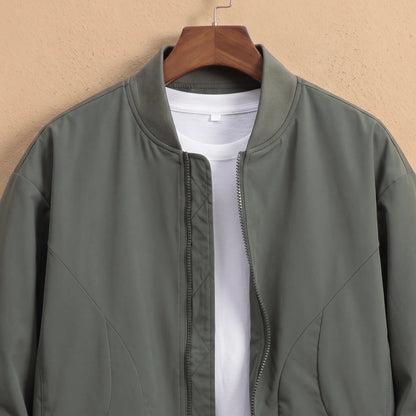 Relaxed Fit Bomber in Green, collar and chest close-up