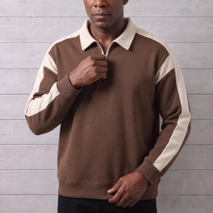 Man zipping up the RETRO COLLAR SWEATSHIRT in brown