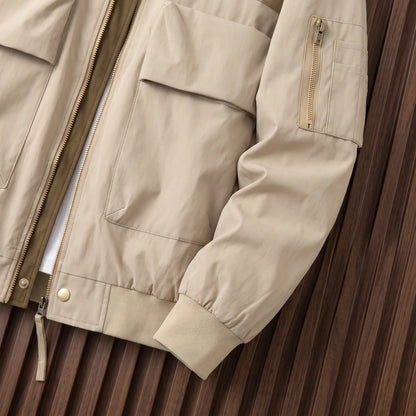 Sleeve zip pocket and rib cuff detail