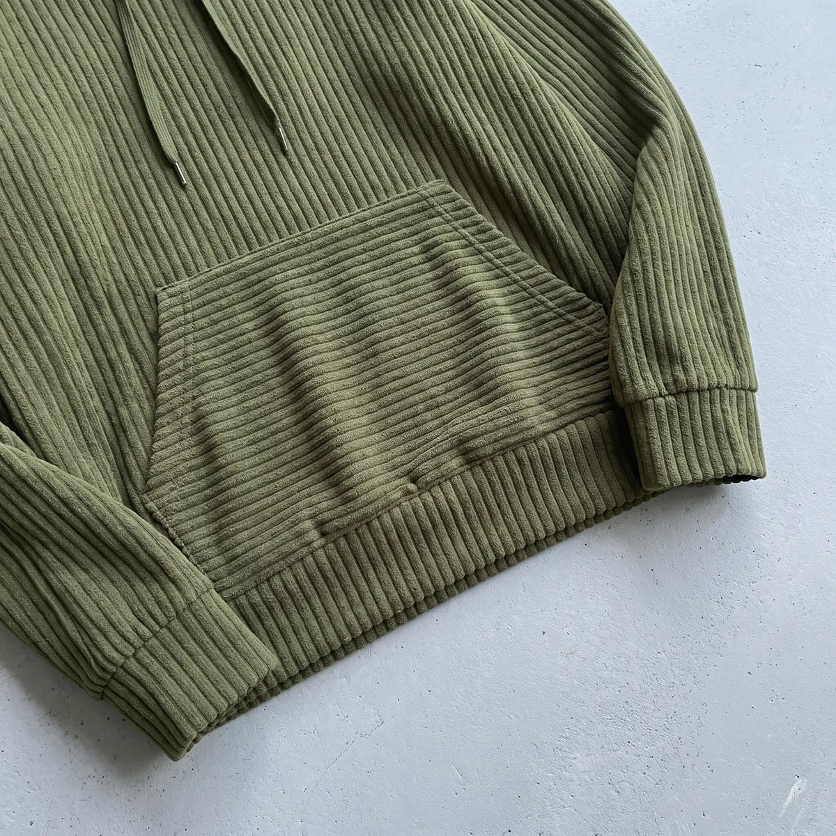RIBBED PULLOVER HOODIE pocket and hem detail