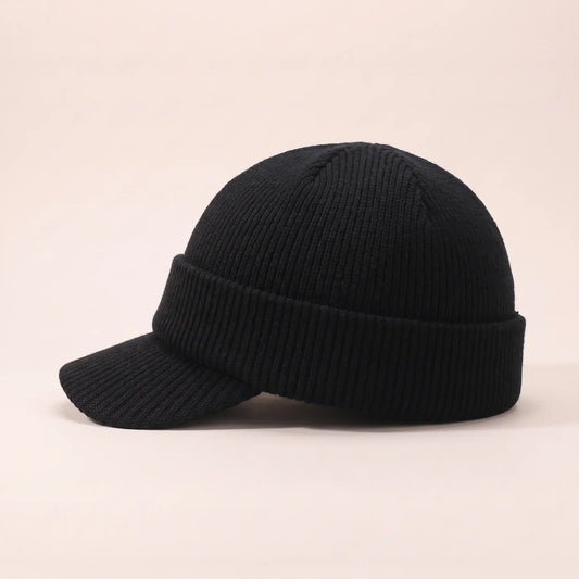 Ribbed visor beanie in black, side view