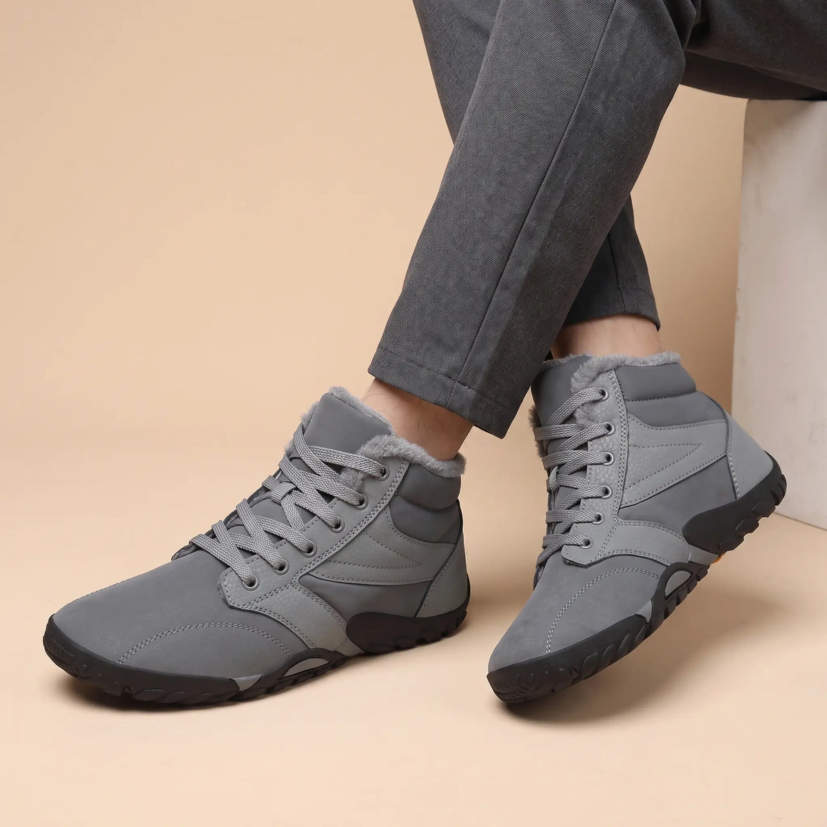 Rolled Collar Boots in Grey worn as a pair with charcoal trousers