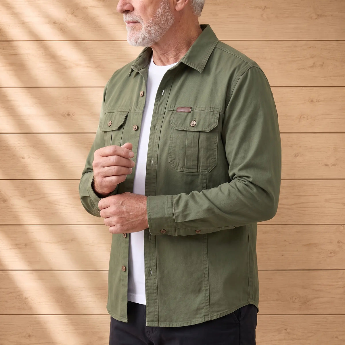 Man wearing the army green rugged field shirt over a white tee