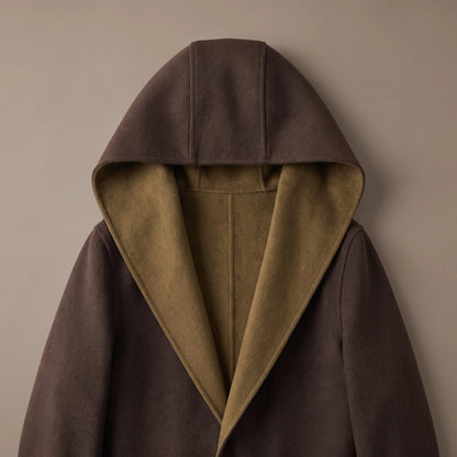 Close up of the SHAWL HOOD COAT hood and shawl lapel showing the contrast facing inside