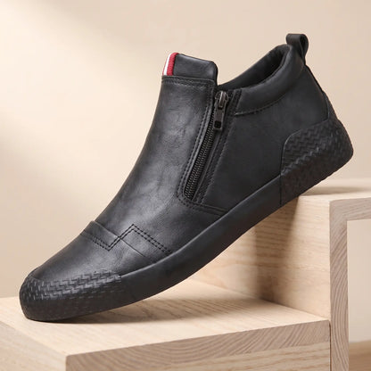 Black leather side zip high top slip on shoes with rubber toe guard