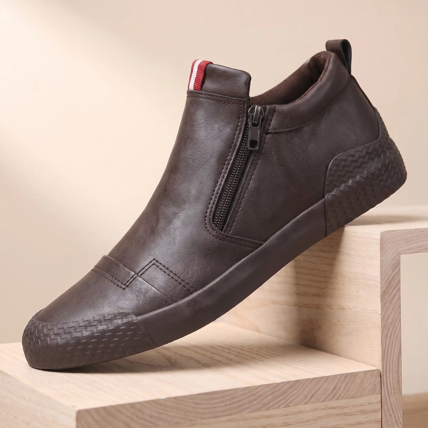 Brown leather side zip high top slip on shoes with rubber toe guard