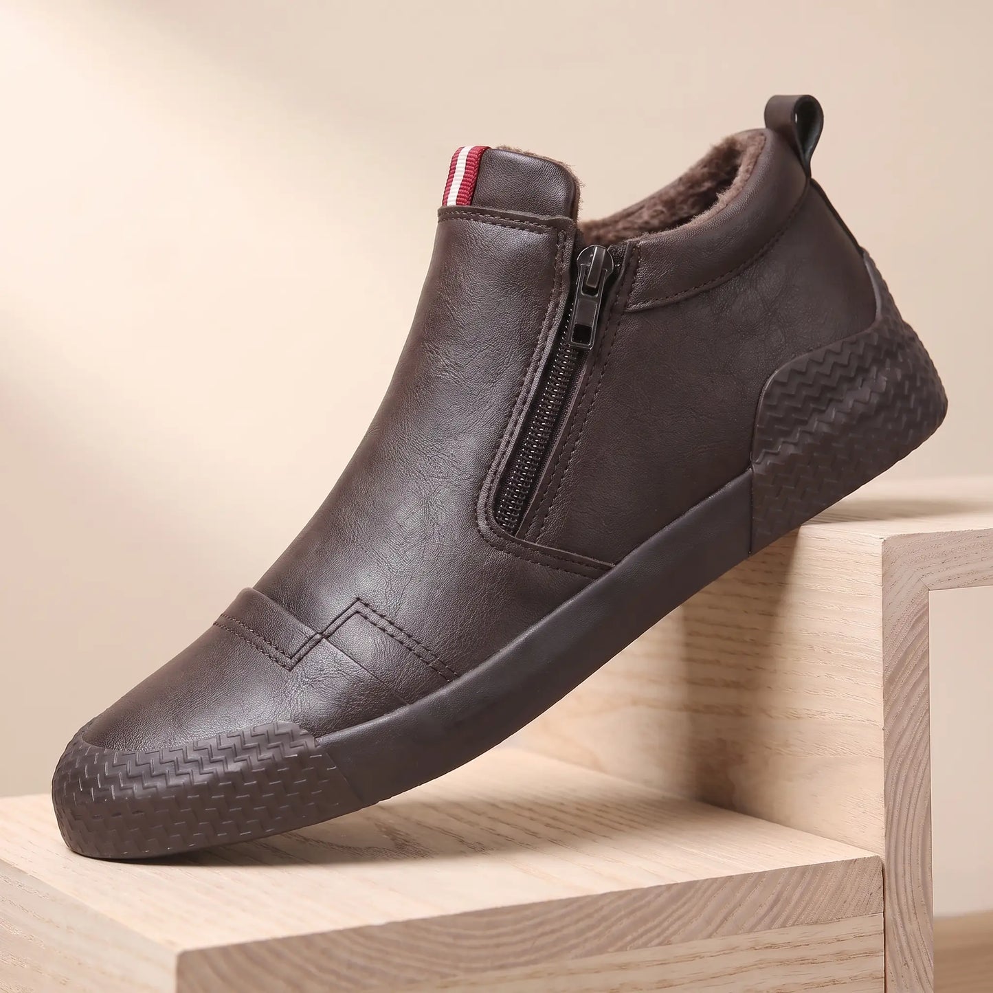 Brown plush lined side zip high top slip on shoes with rubber toe guard