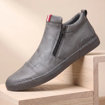 Grey leather side zip high top slip on shoes with rubber toe guard