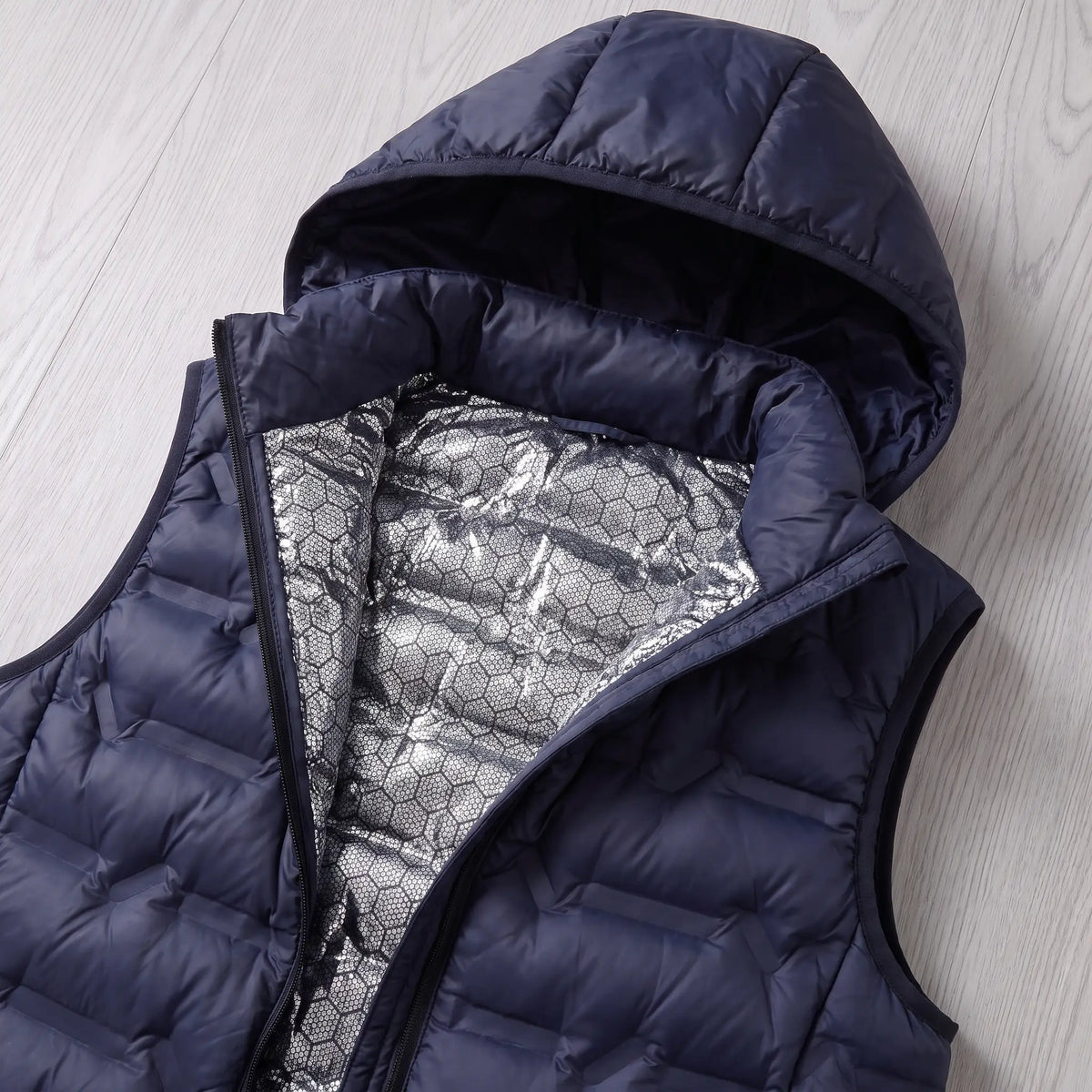 Inside the SILVER LINED PUFFER showing the silver lining and hood