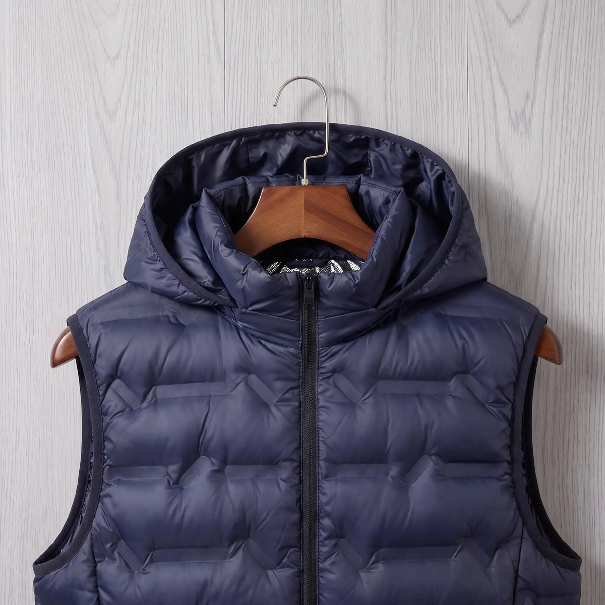 Close up of the SILVER LINED PUFFER hood and zipped collar