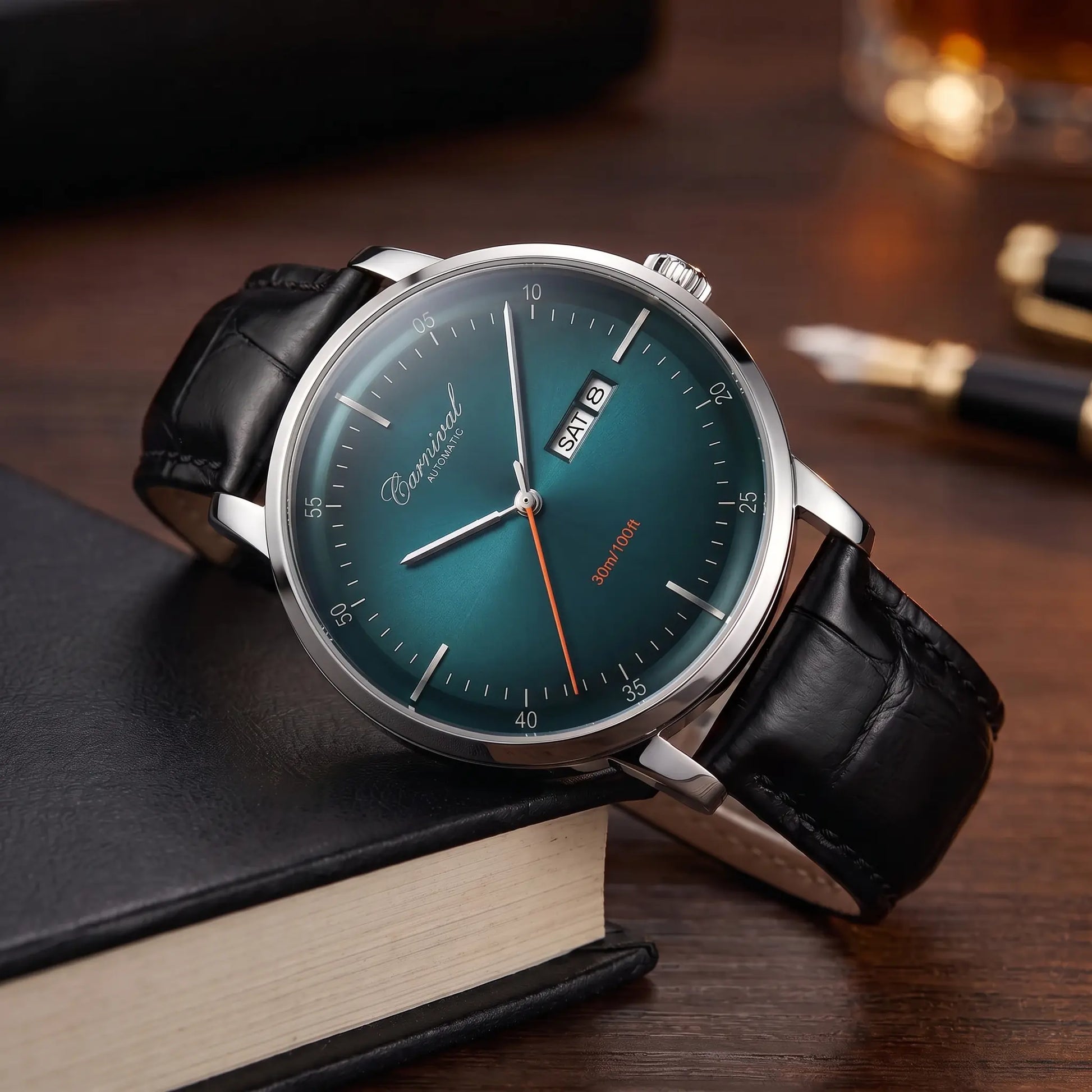 Slim automatic watch with green dial and black leather strap