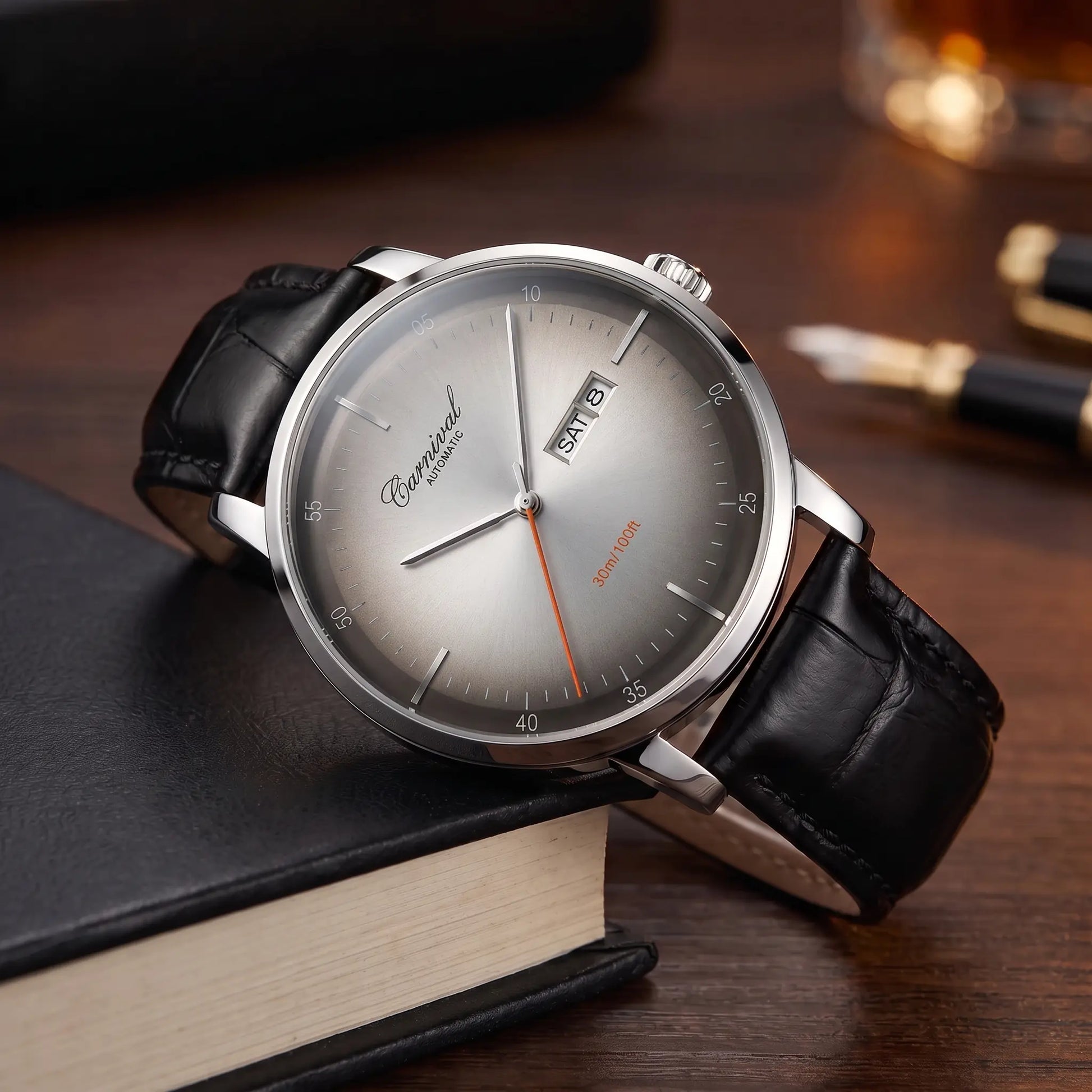 Slim automatic watch with grey dial and black leather strap