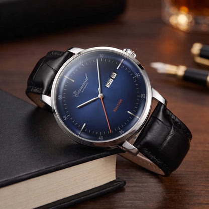 Slim automatic watch with navy dial and black leather strap