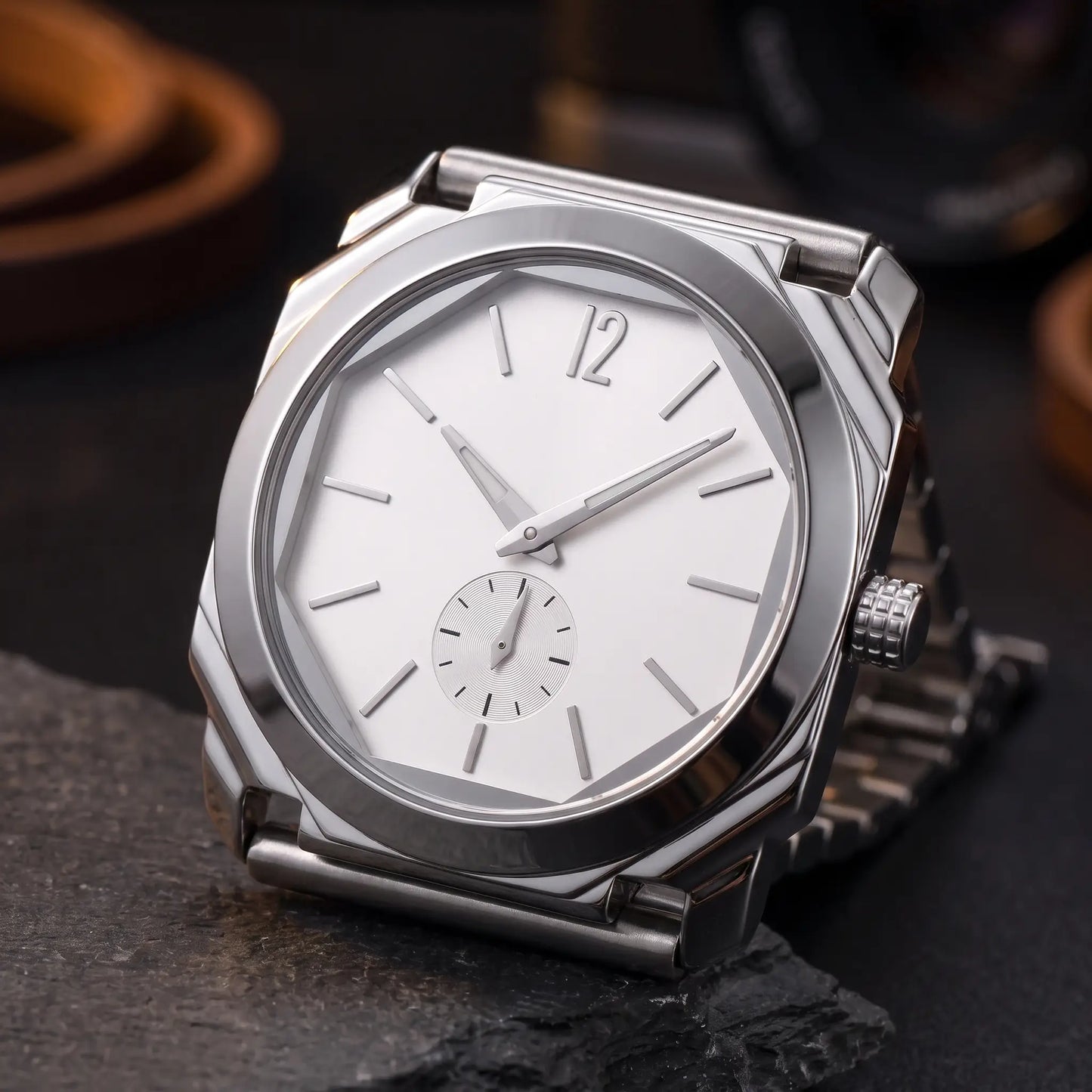 SLIM OCTAGON WATCH dial close-up - octagonal bezel facets, applied 12 numeral and small-seconds sub-dial