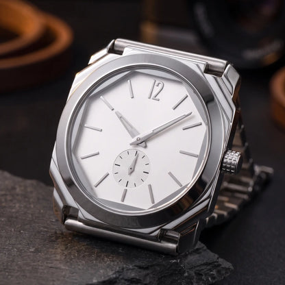 SLIM OCTAGON WATCH dial close-up - octagonal bezel facets, applied 12 numeral and small-seconds sub-dial