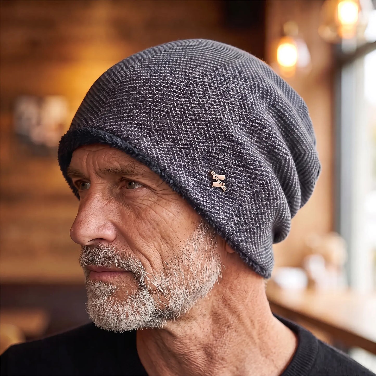 Older man wearing the grey fleece lined slouch knit beanie in side profile