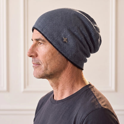 Grey slouch knit beanie in slate herringbone knit, fleece lined men's winter beanie worn in side profile