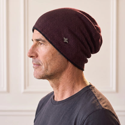 Red wine slouch knit beanie with fine herringbone knit, fleece lined men's winter beanie worn in side profile