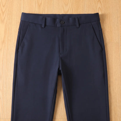 Close up of the SMART LINED TROUSERS waistband, button and slanted front pockets