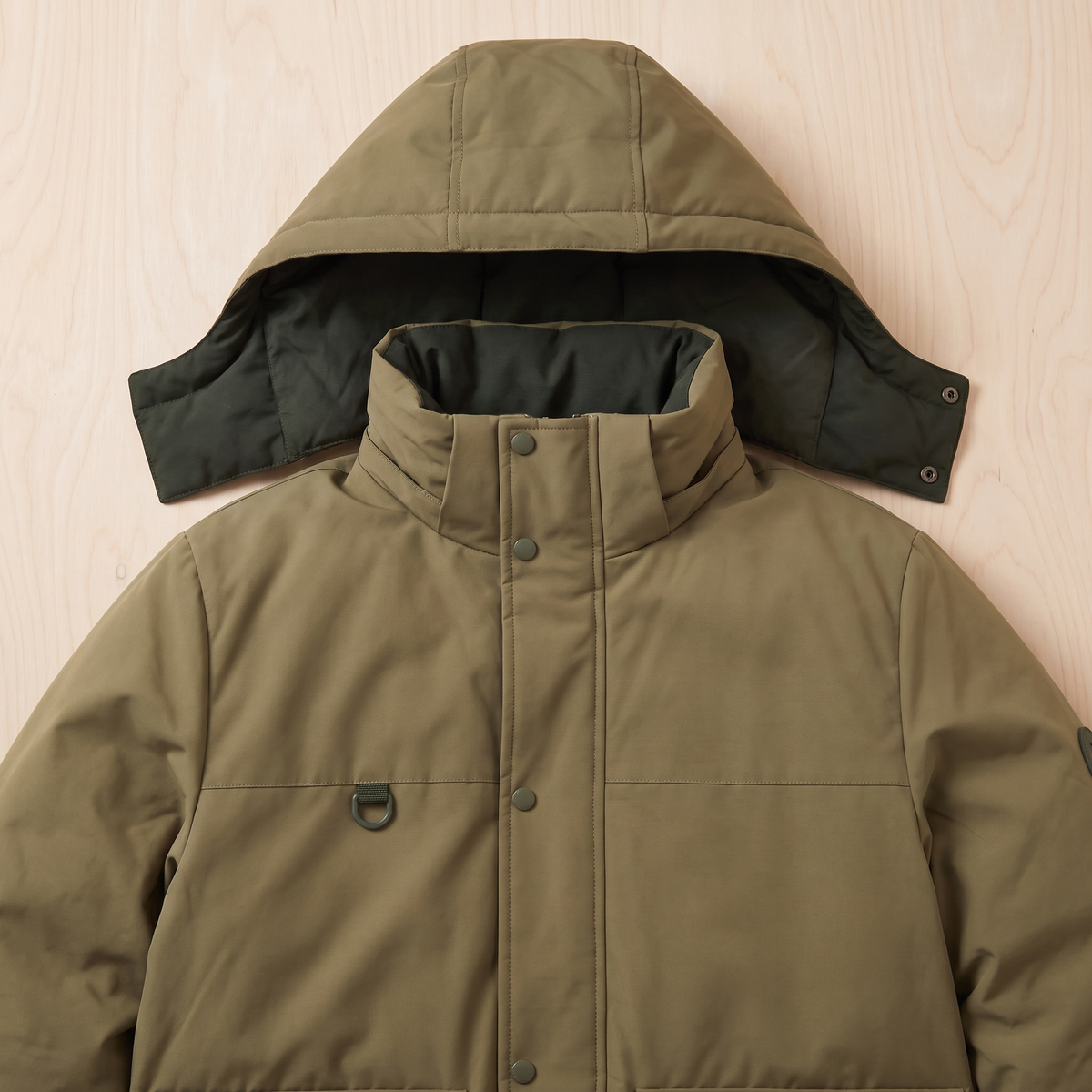 Close detail of the parka hood, collar and chest pockets