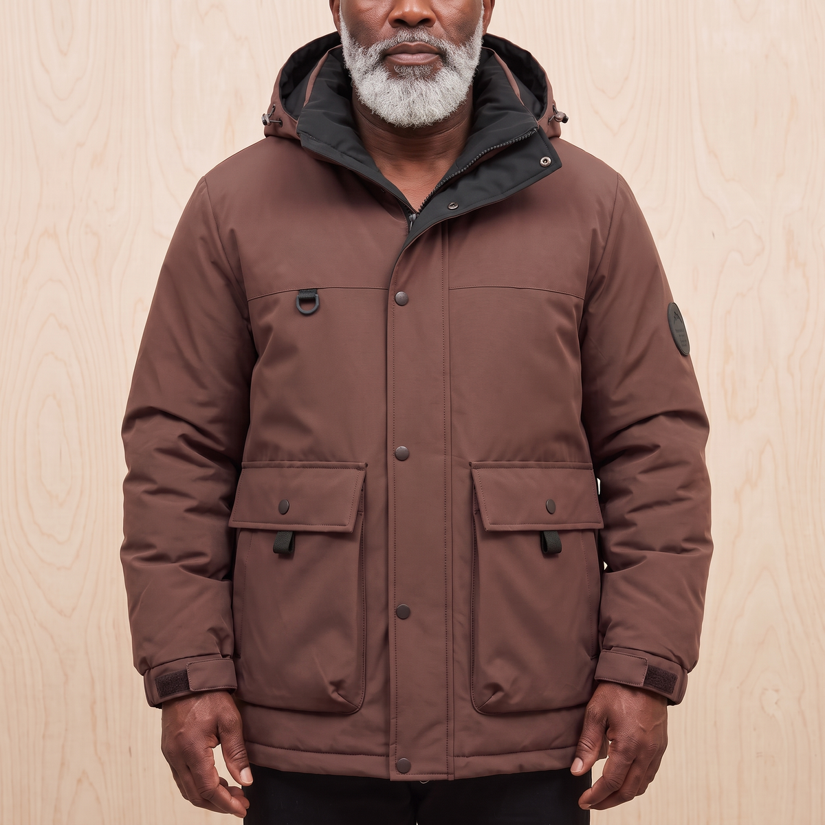 Men's red hooded padded parka with snap storm front