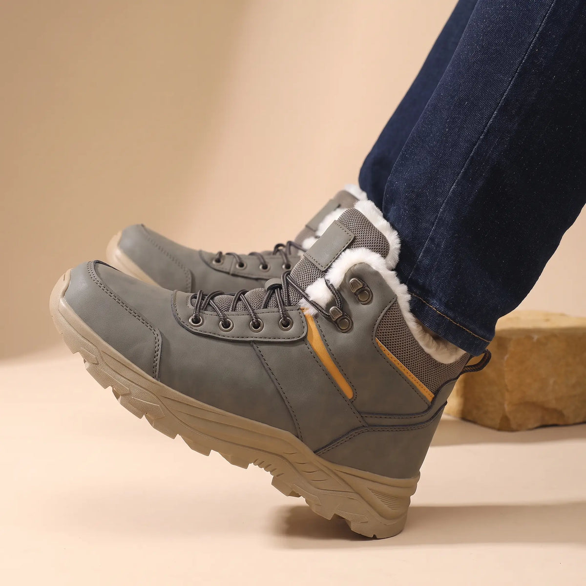 Snow Trail Boots in Grey worn as a pair with dark jeans
