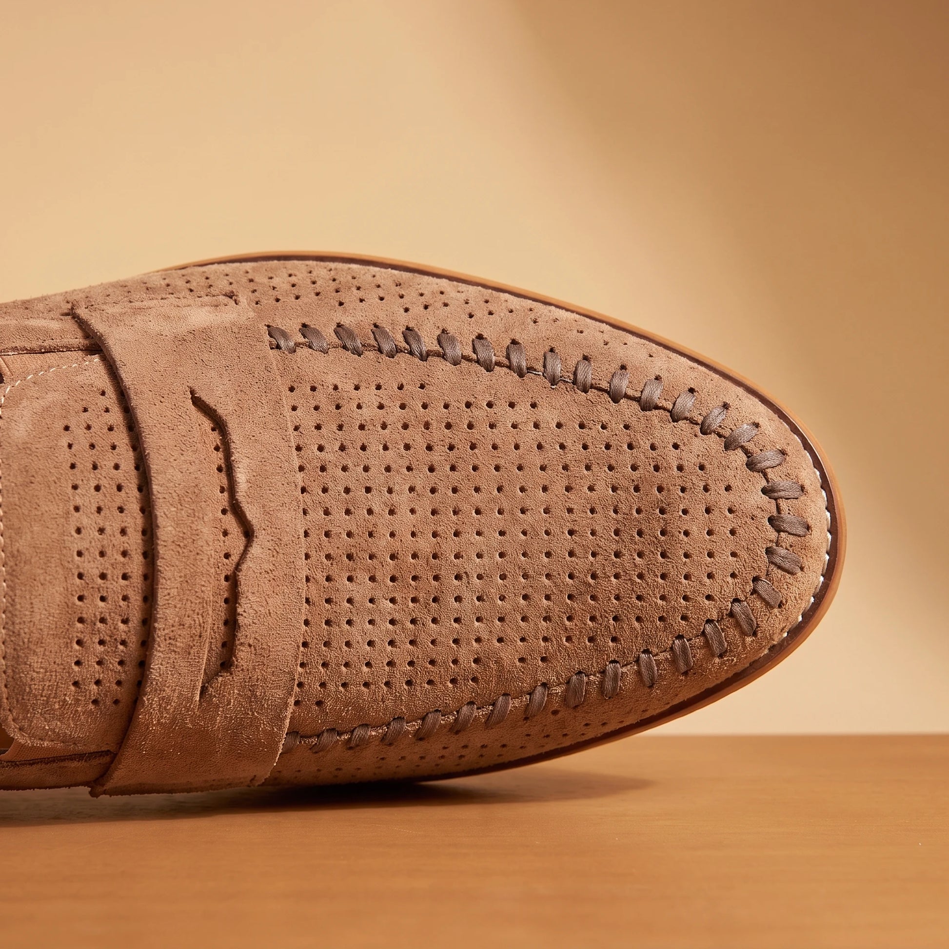 SOFT MOC LOAFERS brown, close-up of perforated vamp, penny strap and moc-toe stitching