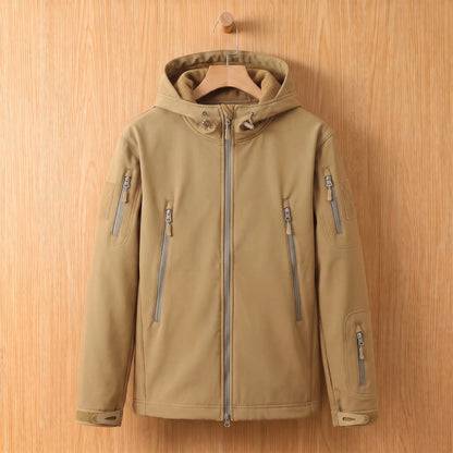 Men's khaki softshell hooded jacket with zip chest pockets on a wooden hanger