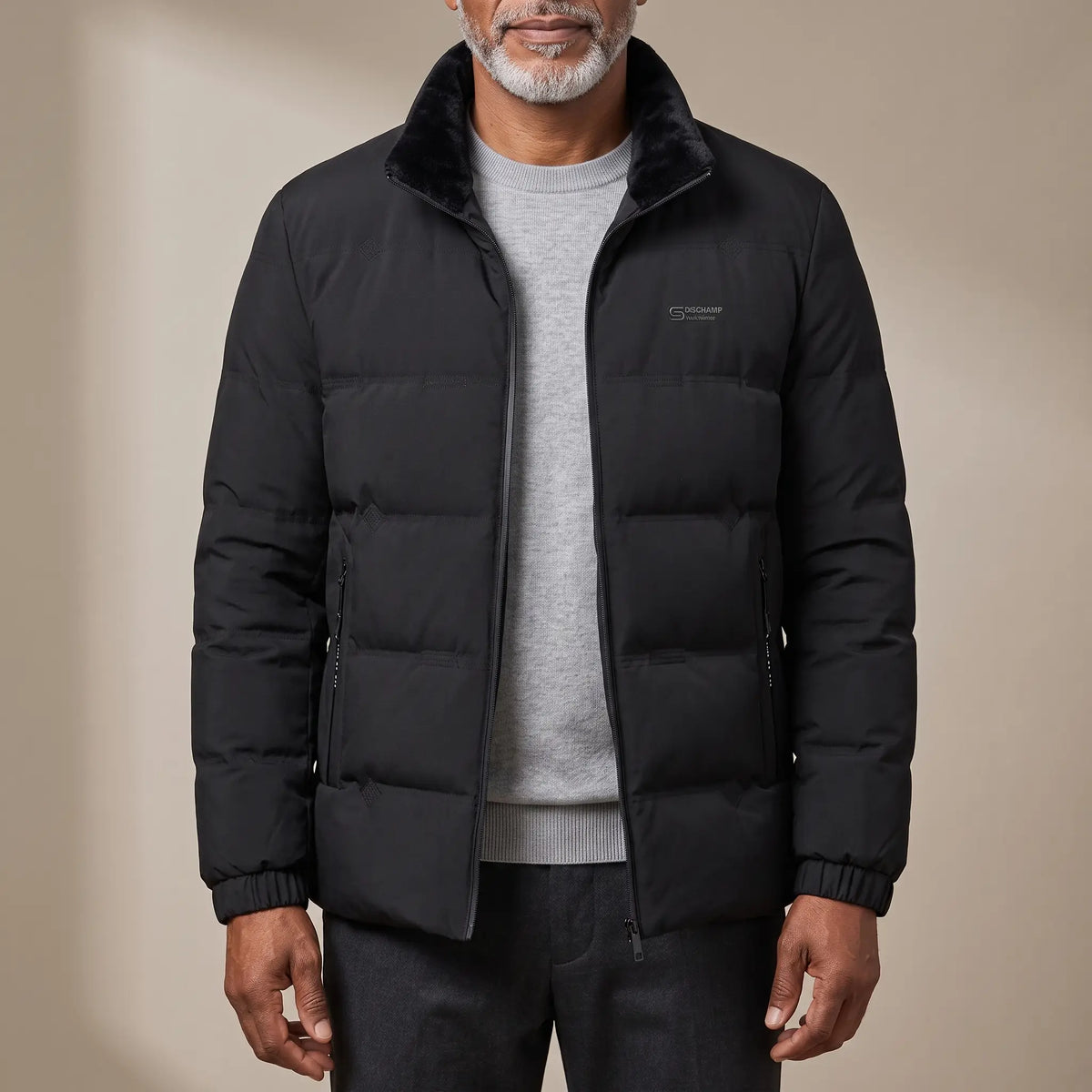 SOFT COLLAR JACKET in black, men's padded stand-collar zip jacket with plush collar, worn over a grey knit