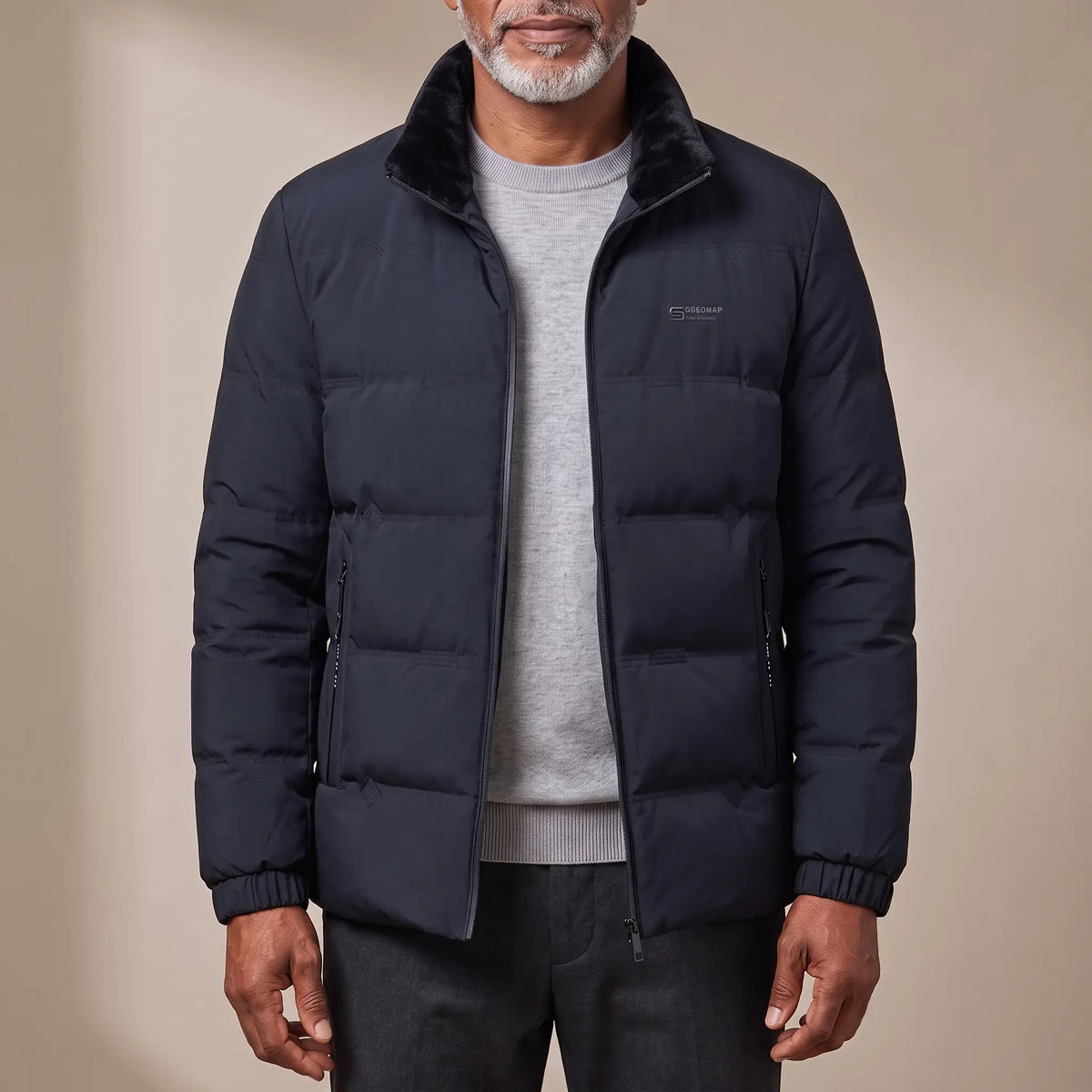 SOFT COLLAR JACKET in navy blue, men's padded stand-collar zip jacket with plush collar, worn over a grey knit