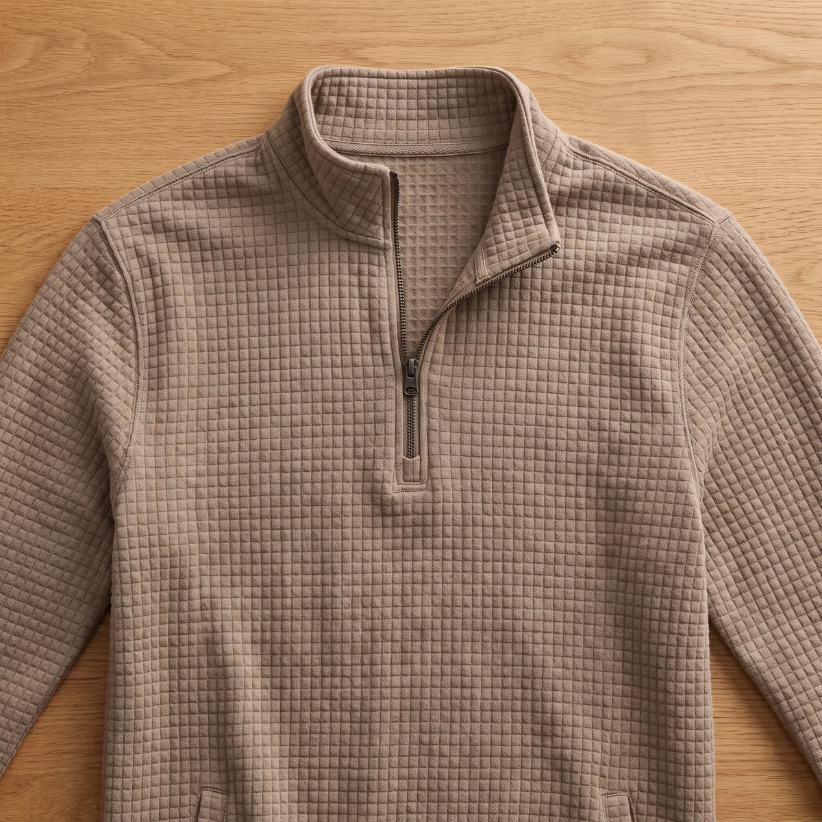 Close detail of SOFT WAFFLE PULLOVER showing the stand collar and quarter zip