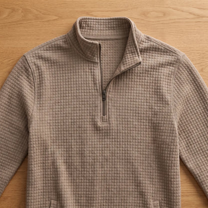 Close detail of SOFT WAFFLE PULLOVER showing the stand collar and quarter zip
