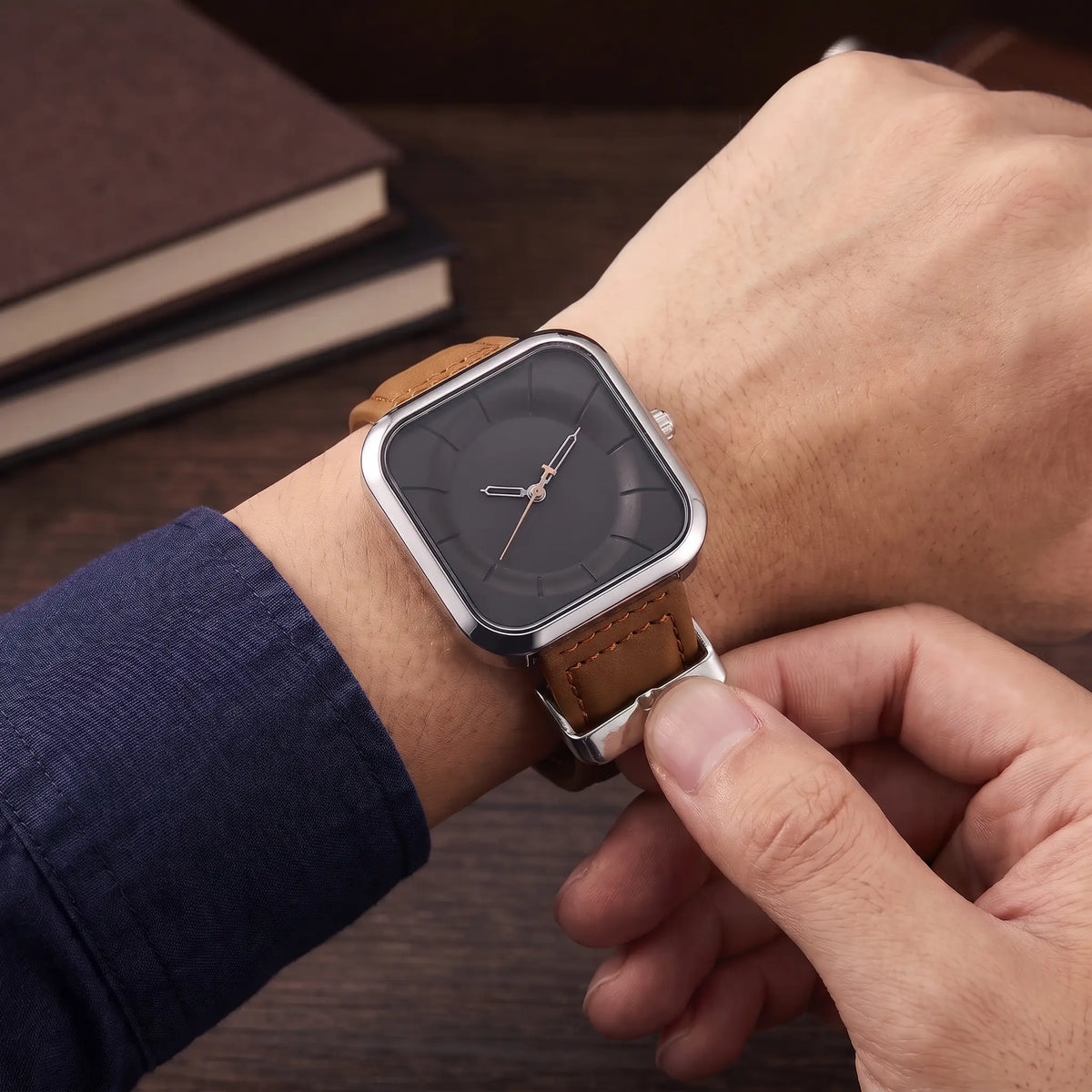 Square Face Watch in Silver Brown being fastened on the wrist